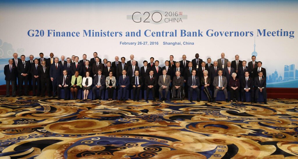 epa05183075 Officials led by host country officials Chinese Finance Minister Lou Jiwei (front 8-L) and People's Bank of China Governor Zhou Xiaochuan (Front 9-L) pose for a family photo of G20 Finance Ministers and Central Bank Governors Meeting at the Pudong Shangri-la Hotel in Shanghai, China, 27 February 2016. Finance officials from G20 member countries are meeting in Shanghai from 26 to 27 February, aiming to formulate reforms for economic growth and strengthen cooperation.  EPA/ROLEX DELA PENA/POOL