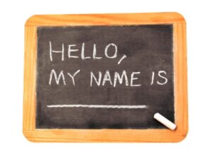 Isolated chaulkboard that states "hello, my name is"