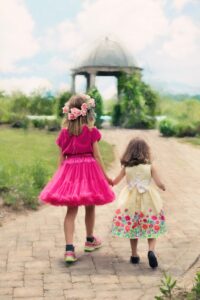little-girls-walking-summer-outdoors-pretty